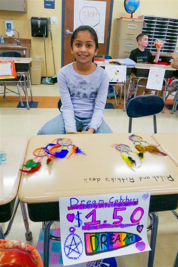 girl selling dream catchers